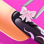 A close-up view of a manicured nail with a black base featuring pink flames, accentuated by a pale pink bow placed on top