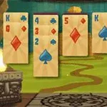 The image features five playing cards displaying a King of Spades, a 5 of Diamonds, and other cards, set in a colorful, animated background with decorative elements resembling a mystical or adventure theme