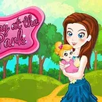 A colorful cartoon scene featuring a girl holding a doll in a park setting, with the title A Day at the Park in a playful font above lush green hills and trees