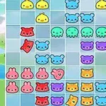 A colorful grid-based puzzle game featuring various cute animals like bears, bunnies, and octopuses, arranged in different colors on a checkerboard background