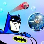 The image features a cartoon-style Batman prominently in the foreground, accompanied by circular bubbles showing different artistic renditions of Batman in various colors against a gradient blue background with soft bubbles