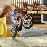 The image features a cartoon-style motocross biker performing a stunt on a red bike, set in a cluttered office environment with a large coffee mug and computer, promoting the game Bike Mania 4: Micro Office