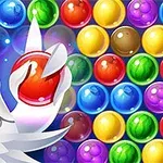 A cartoon chicken holds a colorful ball in front of a vibrant array of bubble-like spheres in various colors, set against a playful background, suggesting a fun and engaging puzzle game