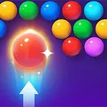 A colorful bubble shooter game image featuring a red bubble with a sparkly effect, positioned below a variety of bubbles in different colors arranged in an arc against a purple background