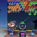 A whimsical character with a wand aims a colorful bubble towards a grid of bubbles in various colors, set against a dark, mystical background featuring a shadowy castle