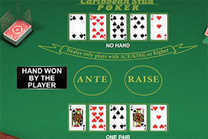 A green poker table displaying a Caribbean Stud Poker game with cards showing No Hand and One Pair, along with the phrases ANTE and RAISE and a note indicating that the hand is won by the player
