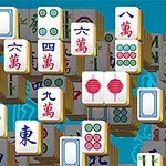 A vibrant Mahjong game layout featuring various colorful tiles, including numbered characters, bamboo symbols, and red lanterns, set against a blue background