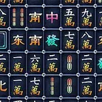 A close-up view of a set of colorful Mahjong tiles arranged in a grid, featuring various Chinese characters and symbols against a dark background