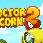 A colorful and playful game title image featuring the text Doctor Acorn 2, accompanied by a cartoonish character and vibrant forest scenery with blue skies and white clouds