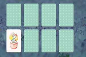 A playful card matching game layout featuring illustrated ice cream cones on one card and empty light blue polka-dotted cards