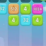 A colorful game interface displaying numbered blocks (4, 32, 512, and 1024) arranged in a grid against a light blue background with whimsical cloud elements