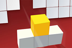A vibrant yellow cube is positioned atop two white cubes, with a background featuring a grid of white squares on a red surface