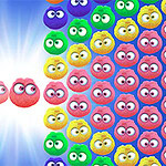 A vibrant background features a burst of light on one side, contrasting with a grid of colorful, cartoonish round characters with large eyes in various shades of red, pink, blue, green, and yellow