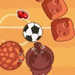 A colorful animated scene featuring a soccer ball surrounded by two playful cartoon animals, a turtle and a bear, on a sandy, obstacle-filled field