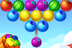 A colorful bubble shooter game screen featuring various fruit-themed bubbles, including orange, purple, yellow, and blue, arranged in a triangular pattern against a bright sky background