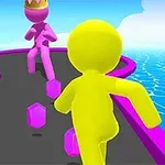 A colorful 3D scene featuring two cartoonish characters racing on a winding path over a vibrant blue ocean, with one character wearing a crown and the other in yellow, collecting hexagonal gems along the way