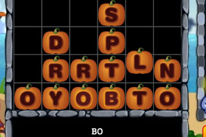 A game board featuring a grid of orange pumpkin-shaped letters arranged in a triangular formation