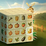 A colorful cube featuring various farm-themed icons such as fruits, vegetables, and animals, set against a picturesque landscape with a windmill and greenery
