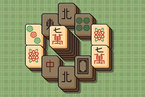 A colorful assortment of Mahjong tiles arranged in a circular pattern on a green checkered background