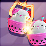 A colorful claw machine featuring two cute plush toys that resemble smiling creatures, each sitting in pink cups with bubble patterns, illuminated by a soft glow