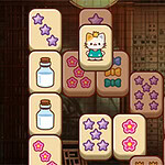 A colorful arrangement of themed tiles featuring a character, bottles, bows, and flowers, stacked among a backdrop of faint, traditional writing
