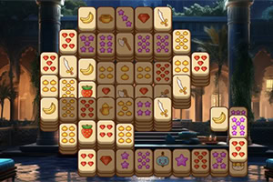 Mahjong-style tile layout with fruit, flowers, hearts, and paw-print icons arranged in tiers against a dimly lit stone temple background