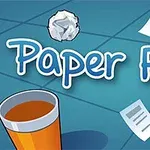 A playful illustration featuring the title Paper Flick with a background of crumpled paper, scattered sheets, a cup, and a small fan, suggesting a lively paper-throwing game theme