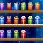 A colorful display of gift boxes in various pastel colors, arranged neatly on three shelves against a blue background with snowflake patterns