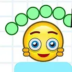 A cheerful yellow emoji face with large blue eyes is holding its cheeks, while green circular shapes above its head suggest a hairstyle, and a pencil is sketching on graph paper in the background