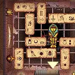 An ancient-themed puzzle game featuring a golden pharaoh surrounded by hieroglyphic tiles on a grid in an Egyptian tomb setting