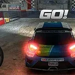 The image shows a racing video game scene featuring a blue and yellow car at the starting line in a snow-covered environment, with a bold GO!