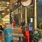 A vibrant train station scene featuring colorful luggage, flowering plants, a guitar, and a clock, with a person waiting near a blue and yellow train