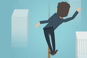 A cartoon-style character in a business suit is precariously balancing on a rope high above city buildings against a blue sky backdrop