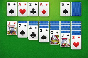 A layout of playing cards on a green background, featuring various suits and ranks including aces and face cards