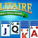 An illustration of a Solitaire Daily Challenges game featuring a blue background, a title banner, and a display of playing cards, including 9, 10, J, Q, K, and A in a standard layout