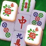 A colorful Mahjong game tile arrangement featuring floral designs and characters, set against a green background with scattered petals