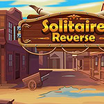 A wooden sign with the text Solitaire Reverse is prominently displayed against a colorful western town backdrop, featuring rustic buildings, a dirt street, and a blue sky with scattered clouds