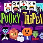 A colorful illustration featuring spooky cartoon characters like vampires, mummies, and a pumpkin, along with playing cards showing Jacks, Queens, Kings, and a Joker, all set against a purple Halloween-themed background labeled Spooky TriPeaks