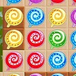 A colorful grid filled with various swirled lollipops in bright hues, arranged in a playful pattern against a light backdrop, ideal for a candy-themed game or illustration