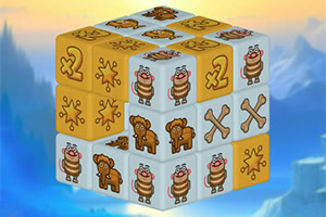 A 3D cube puzzle with cartoon animal and icon tiles in yellow and white, set against a blue icy landscape