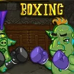 Two cartoonish green creatures with distinct hairstyles and boxing gloves are shown in a boxing match setting, with the word BOXING prominently displayed above them