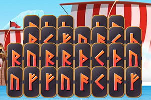 Rows of black tiles with orange rune-like symbols in front of red-and-white striped tents